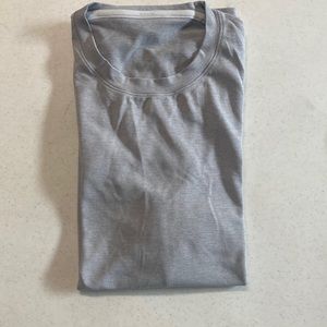 Lululemon men’s light gray, running shirt with reflective stripe on hem - Large
